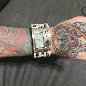 L.A.M.B. White and black leather watch. Needs battery replaced.